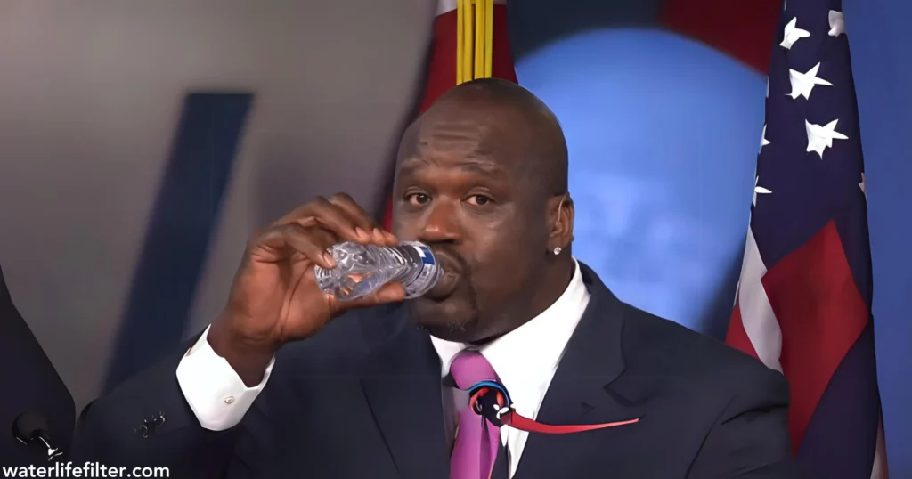 Shaq Holding A Water Bottle